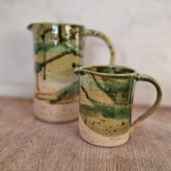 Grnne kander med lava-pletter