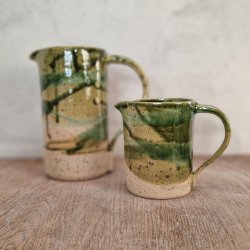 Grnne kander med lava-pletter