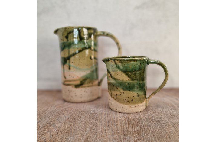 Grnne kander med lava-pletter