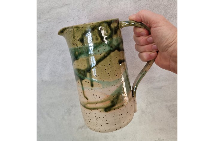 Grnne kander med lava-pletter